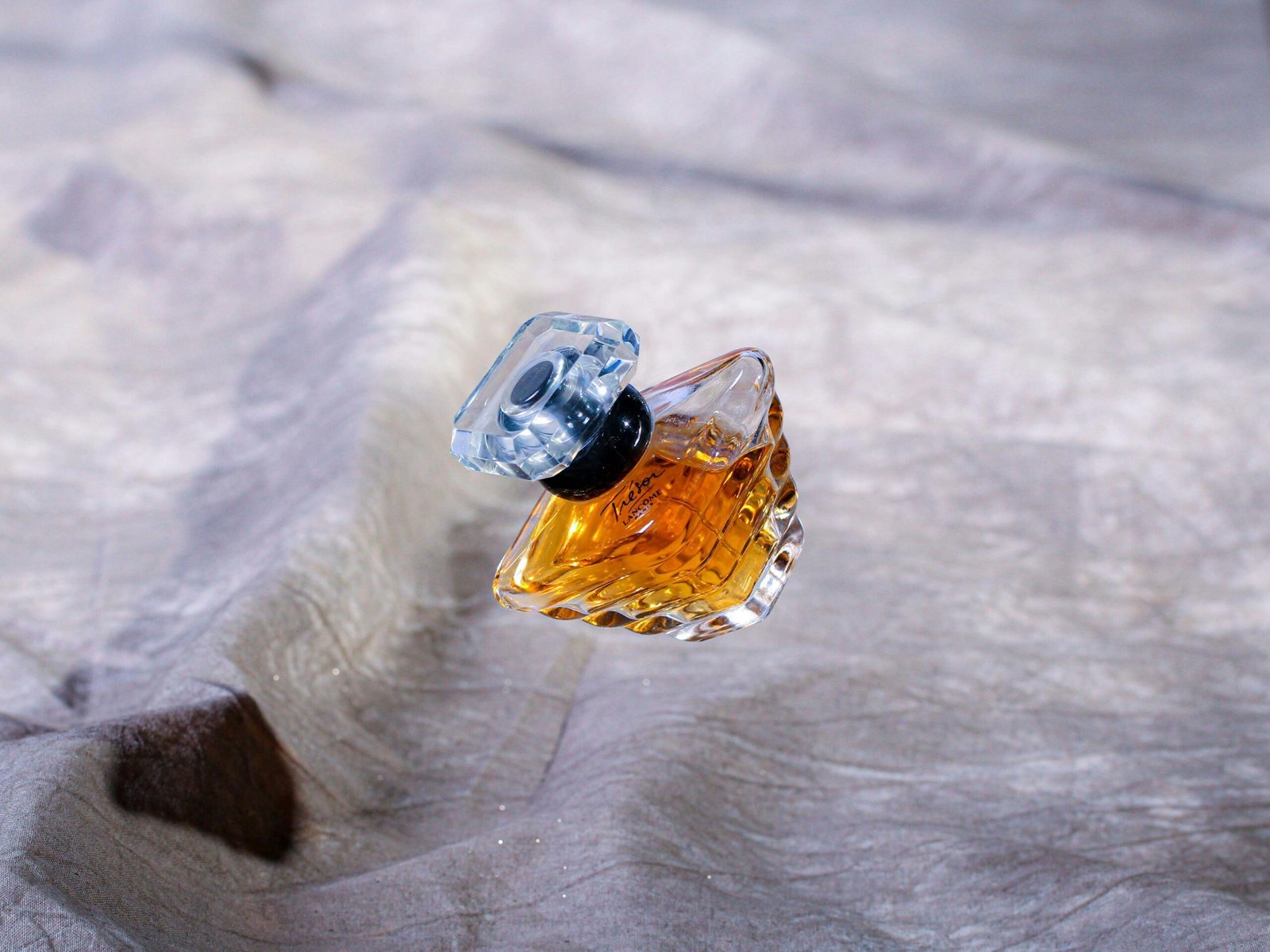 a close up of a glass ring on a table